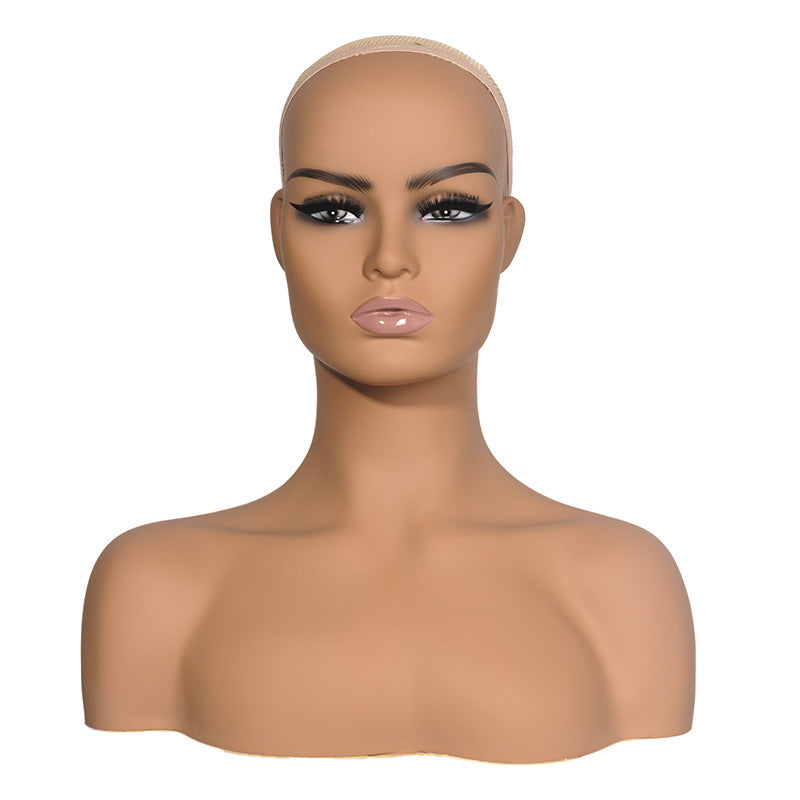 Pruikpresentatie, modelhoofd, koptelefoon, oorbellen, mannequin